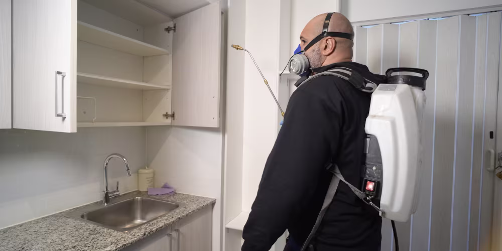 Pesticon technician treating a Vancouver home