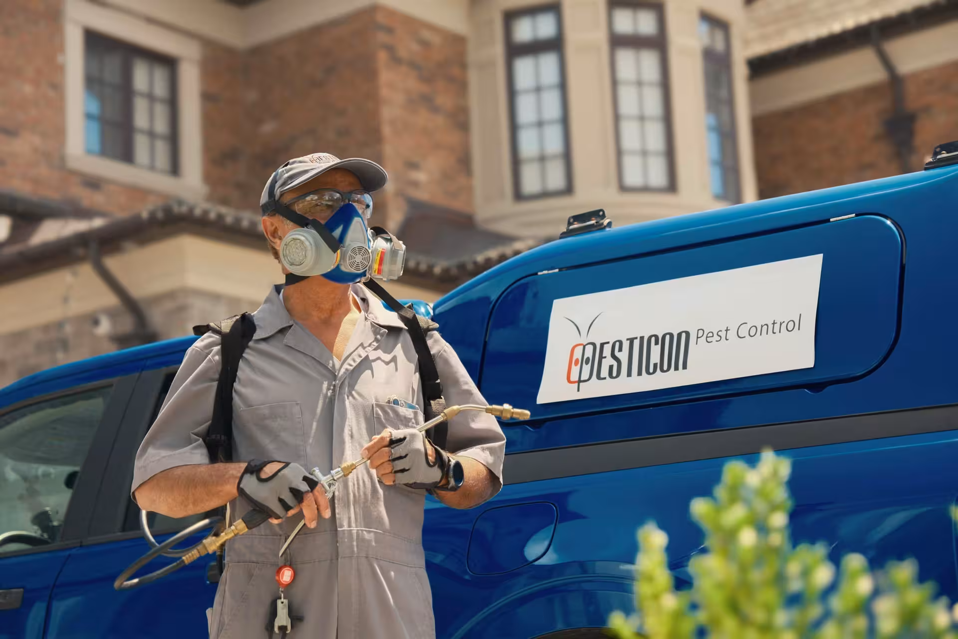 Pesticon technician arriving in a branded Pesticon Pest Control van in Vancouver