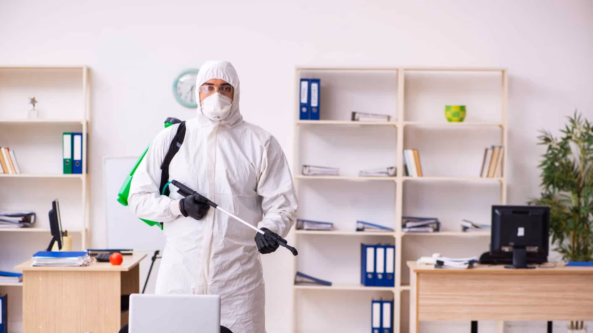 Pesticon technician performing commercial pest control at a Langley business